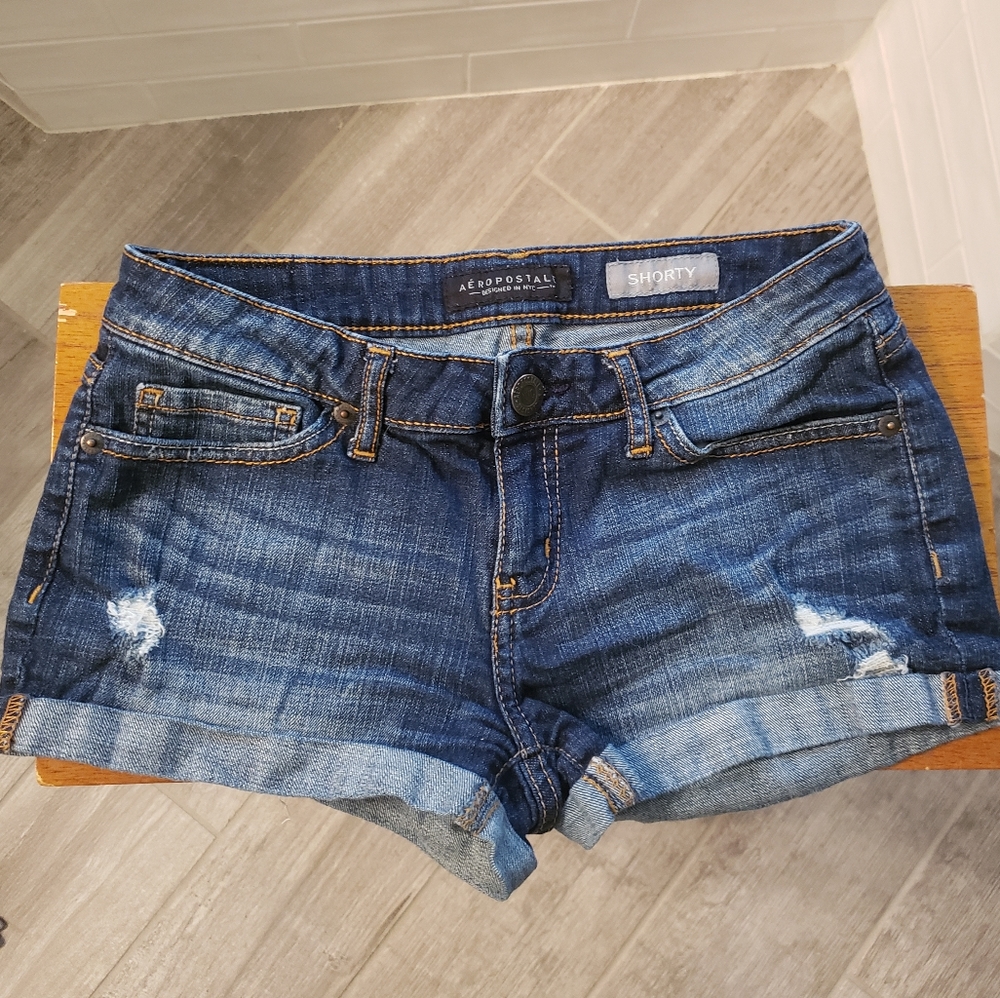 Dark Distressed Denim Jeans